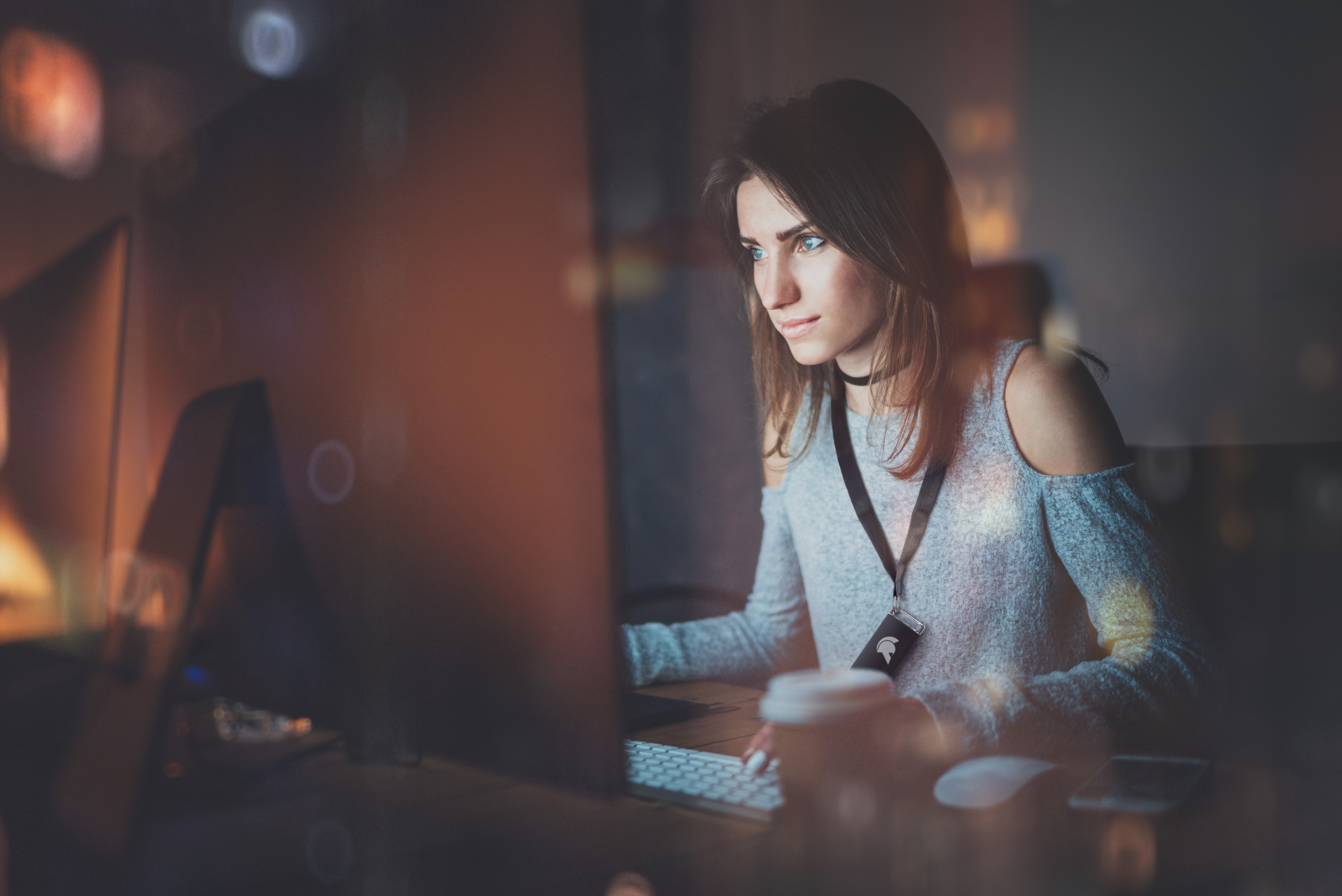 GateKeeper_Proximity_2FA_Login_for_PCs_and_websites_compliance_Woman_Working_Late_In_Office-2.jpg